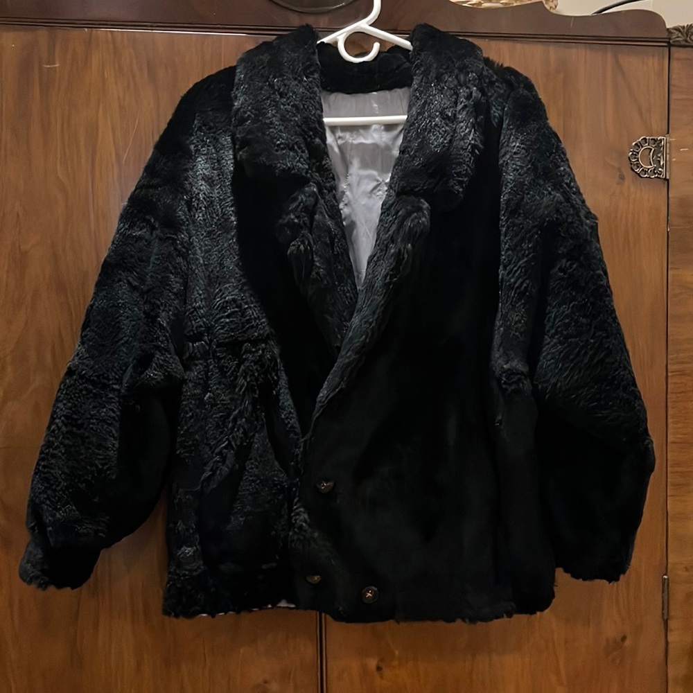 Black genuine fur coat.